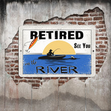 Load image into Gallery viewer, Dyenamic Art - Retired on the River Metal Sign – A Relaxing Fishing Retirement Gift Featuring a Fisherman in a Boat, a Jumping Fish, and a Sunset Over the Water. A Perfect Gift for River and Fishing Enthusiasts.
