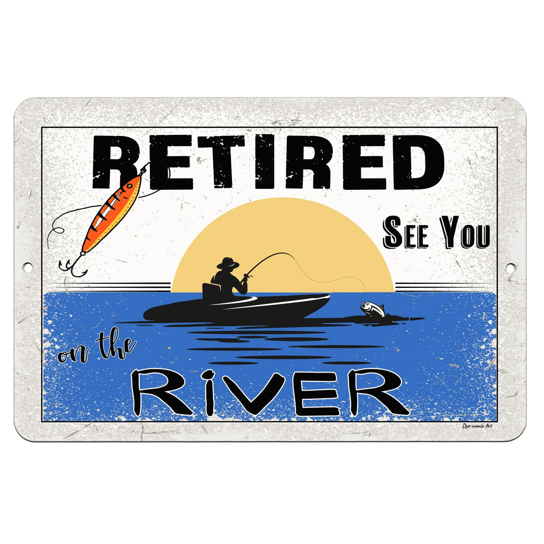 Dyenamic Art - Retired on the River Metal Sign – A Fishing-Inspired Retirement Sign Featuring a Vintage-Style Illustration of a Fisherman Casting a Line at Sunset. Ideal for Cabin, Lodge, or River House Decor.