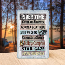 Load image into Gallery viewer, Rustic River Time Coffee &amp; Sunrises Metal Sign displayed on a cozy porch overlooking a river, adding charm to cabins, docks, and waterfront retreats.
