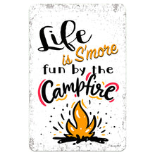 Load image into Gallery viewer, Life is S'more Fun by the Campfire Metal Sign – A playful camping sign featuring a bright campfire illustration on a distressed white background. Perfect for RV, camper, and outdoor decor by Dyenamic Art.
