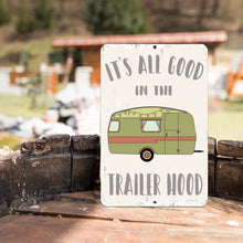 Load image into Gallery viewer, It&#39;s All Good in the Trailer Hood Metal Sign styled outdoors in a scenic setting, perfect for camper van enthusiasts and travel lovers.
