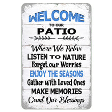 Load image into Gallery viewer, The Dyenamic Art Welcome to Our Patio sign featuring an inviting message on a distressed white plank background, ideal for outdoor relaxation spaces.
