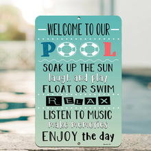 Load image into Gallery viewer, Detailed close-up of the Welcome to Our Pool Metal Sign, highlighting high-resolution print, bright colors, and pre-drilled holes for easy mounting.
