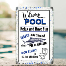 Load image into Gallery viewer, Detailed close-up of the Welcome to Our Pool Metal Sign, showcasing high-resolution print, bold shark illustration, and pre-drilled holes for easy mounting.

