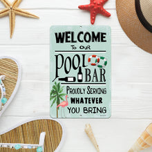 Load image into Gallery viewer, Funny Welcome to Our Pool Bar Metal Sign displayed on a bright, tropical background with summer accessories like a starfish, seashells, and a sunhat. Perfect for beach house or patio decor.
