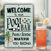 Load image into Gallery viewer, Dyenamic Art Pool Bar Metal Sign displayed next to a tropical cocktail by the pool, creating a relaxed and inviting atmosphere. Ideal for outdoor entertaining spaces, cabanas, and beach resorts.
