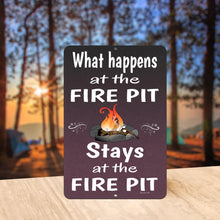 Load image into Gallery viewer, Funny quote, what happens at the fire pit stays at the fire pit metal sign in an outdoor setting.
