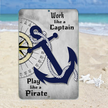 Load image into Gallery viewer, Detailed close-up of the Dyenamic Art Work Like a Captain, Play Like a Pirate Metal Sign, highlighting the intricate anchor and rope design with a classic compass in the background.
