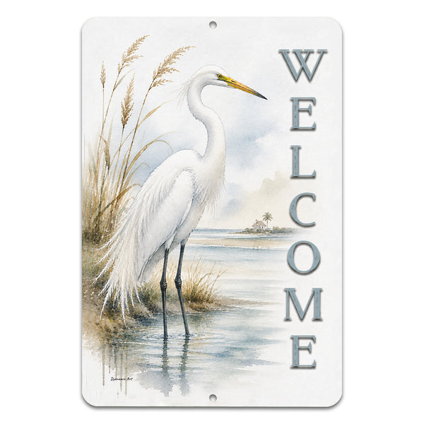 Decorative sign with a white egret by water, featuring the word 'Welcome'.
