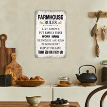 Load image into Gallery viewer, A rectangular distressed metal sign with the text 'FARMHOUSE RULES' and a list of traditional farm values, displayed on a beige wall in a rustic kitchen setting with a teapot, bread, and wooden utensils.
