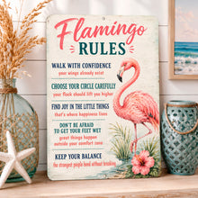 Load image into Gallery viewer, Flamingo Rules beach house sign displayed on a coastal shelf with nautical décor, seashells, and beach-inspired accents
