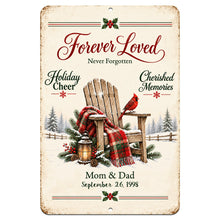 Load image into Gallery viewer, Personalized Forever Loved Christmas memorial metal sign featuring a red cardinal, empty rocking chair, plaid blanket, and custom family remembrance text, shown on white background.

