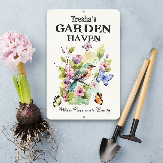 Close-up of personalized Garden Haven sign with watercolor artwork