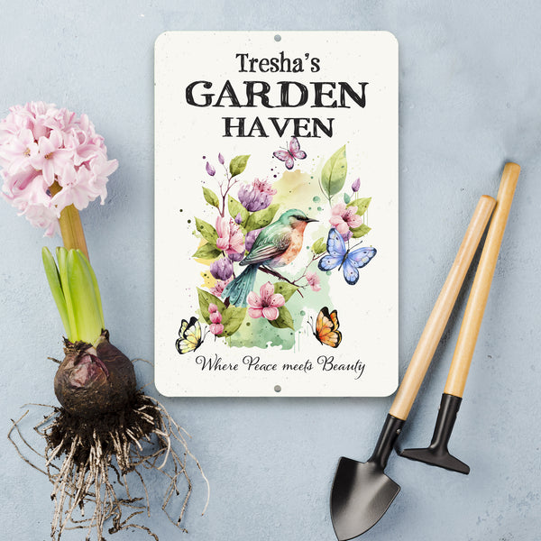 Close-up of personalized Garden Haven sign with watercolor artwork