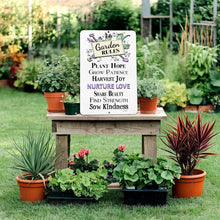Load image into Gallery viewer, Inspirational garden sign displayed near potted plants and gardening supplies in a greenhouse or potting area.
