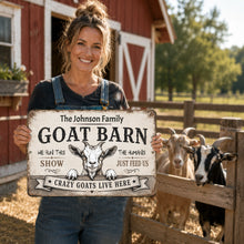 Load image into Gallery viewer, Smiling woman holding personalized goat barn sign beside goats on rustic farmhouse property
