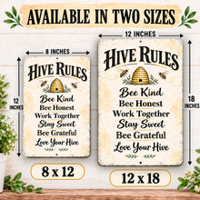Load image into Gallery viewer, Hive Rules honeybee metal wall art displayed in 8 by 12 inch and 12 by 18 inch sizes, featuring a golden beehive, flying bees, and vintage-style typography.
