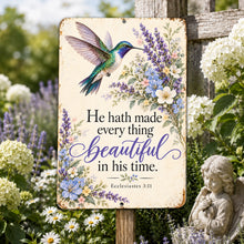 Load image into Gallery viewer, Ecclesiastes 3:11 hummingbird wall sign displayed beside purple garden flowers, featuring a vintage cream background and inspirational Bible verse.
