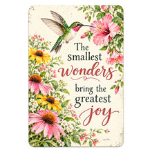 Load image into Gallery viewer, Smallest Wonders Hummingbird Garden Sign featuring a green hummingbird, pink and yellow flowers, and inspirational quote on a cream aluminum sign.
