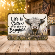 Load image into Gallery viewer, Highland cow barnyard metal sign displayed in rustic farmhouse room with wood decor
