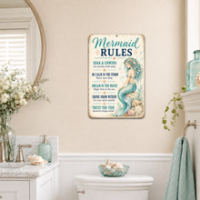 Load image into Gallery viewer, Mermaid Rules wall sign displayed above a toilet in a bright coastal bathroom with aqua accents
