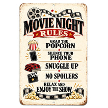Load image into Gallery viewer, Movie Night Rules metal sign featuring vintage film reels, a clapperboard, popcorn, and red-and-black cinema lettering on a cream background.
