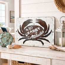 Load image into Gallery viewer, A rectangular decorative sign with a distressed white background and a large dark brown crab silhouette. The sign reads 'NO CRABBY Attitudes' in white script and serif lettering.
