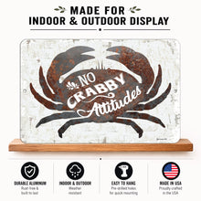 Load image into Gallery viewer, A rectangular metal sign with a distressed white background and a large black crab graphic. The sign reads 'NO CRABBY Attitudes' in white script and serif fonts.
