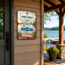 Load image into Gallery viewer, Custom family lake house metal sign displayed on covered waterfront porch
