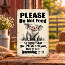 Load image into Gallery viewer, Funny pig metal sign displayed in a warm farm setting with red barn, fence, flowers, and hay bales
