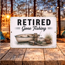 Load image into Gallery viewer, Retirement fishing metal sign displayed in cozy rustic cabin setting with warm outdoor lake decor theme
