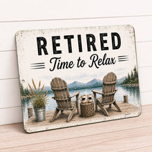 Load image into Gallery viewer, Metal sign with 'Retired Time to Relax' text and a scenic design of chairs by a lake.
