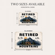 Load image into Gallery viewer, Two sizes of 'Retired See You in the Mountains' signs with mountain and cabin design.

