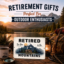 Load image into Gallery viewer, Retirement gift sign for outdoor enthusiasts with mountain scene, coffee cup, and backpack.
