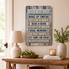 Load image into Gallery viewer, Retirement Rules metal sign displayed above a rustic wood console table with lamp, greenery, candle, and neutral farmhouse decor
