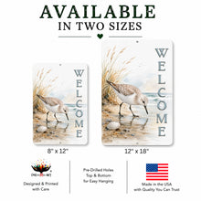 Load image into Gallery viewer, Two sizes of 'Welcome' signs with sandpipers and grasses, featuring pre-drilled holes for hanging.
