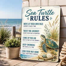 Load image into Gallery viewer, Sea Turtle Rules coastal metal sign displayed outdoors near the beach with ocean views and coastal scenery
