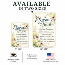 Load image into Gallery viewer, Two sizes of a 'A Servant's Heart' hanging sign shown on a white background with text indicating availability in two sizes: 8" x 12" and 12" x 18". The sign features a cream background with a floral border, a hummingbird, and a printed inspirational Bible verse.
