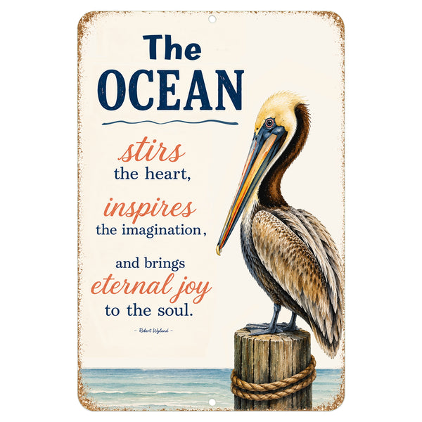 The Ocean Stirs the Heart pelican metal sign with inspirational coastal quote, beach house wall decor featuring pelican artwork and ocean-inspired design