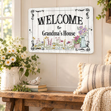 Load image into Gallery viewer, Custom Grandma welcome sign styled in a bright farmhouse porch setting with flowers and greenery
