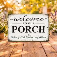 Load image into Gallery viewer, Rustic farmhouse porch welcome sign displayed on a wooden patio table with outdoor string lights and flowers in a cozy backyard setting.
