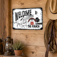 Load image into Gallery viewer, Welcome to the Ranch metal sign displayed on a rustic western barn wall with cowboy hat, rope, and lantern decor
