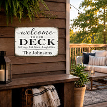 Load image into Gallery viewer, Welcome sign on a wooden deck with outdoor furniture and plants with personalized name
