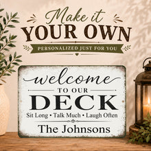 Load image into Gallery viewer, Personalized sign for a deck with decorative elements on a wooden surface.
