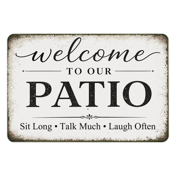 Decorative sign with 'Welcome to our Patio' text on a white distressed background