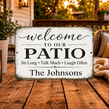 Load image into Gallery viewer, Decorative sign on a patio with 'welcome to our patio' text and personalized name.
