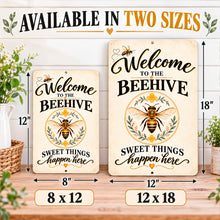 Load image into Gallery viewer, Welcome to the Beehive metal sign shown in 8 by 12 and 12 by 18 inch sizes with golden honeybee artwork and vintage lettering.
