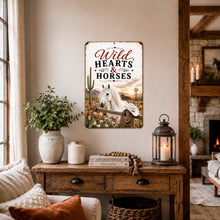 Load image into Gallery viewer, Wild Hearts &amp; Horses metal sign displayed above a console table in rustic farmhouse room
